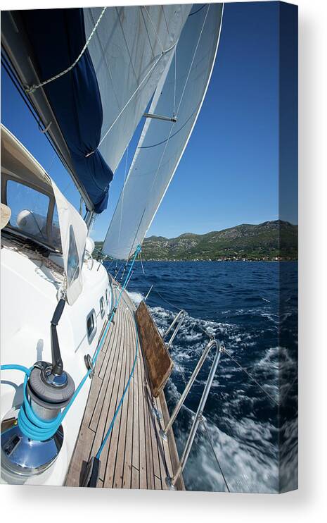 Curve Canvas Print featuring the photograph Sailing In The Wind With Sailboat #4 by Mbbirdy