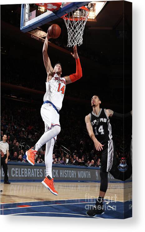 Willy Hernangomez Canvas Print featuring the photograph San Antonio Spurs V New York Knicks by Nathaniel S. Butler
