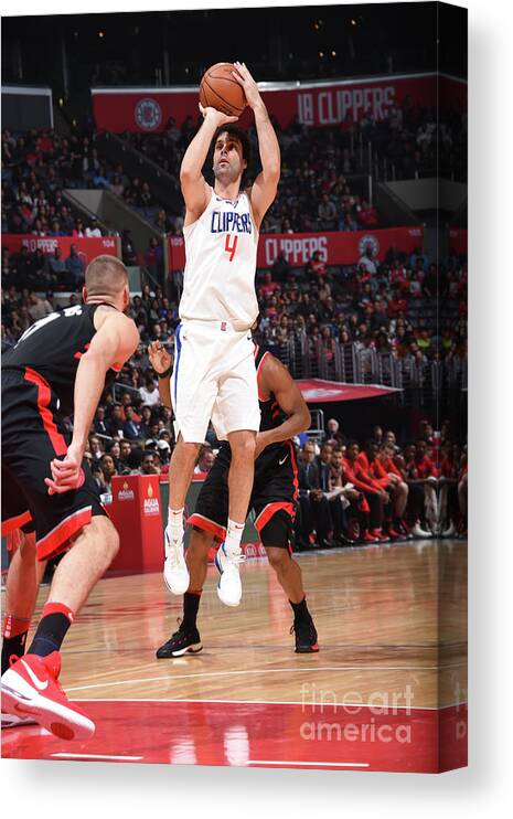 Milos Teodosic Canvas Print featuring the photograph Toronto Raptors V La Clippers by Andrew D. Bernstein