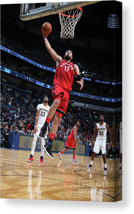 Smoothie King Center Canvas Print featuring the photograph Toronto Raptors V New Orleans Pelicans by Layne Murdoch Jr.