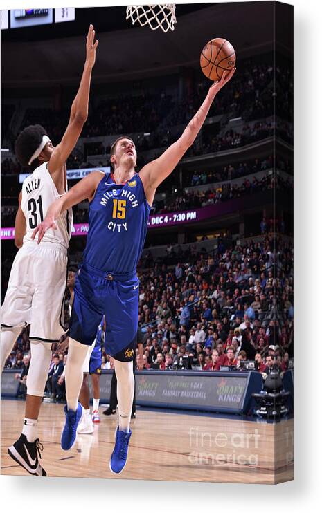 Nba Pro Basketball Canvas Print featuring the photograph Brooklyn Nets V Denver Nuggets by Garrett Ellwood
