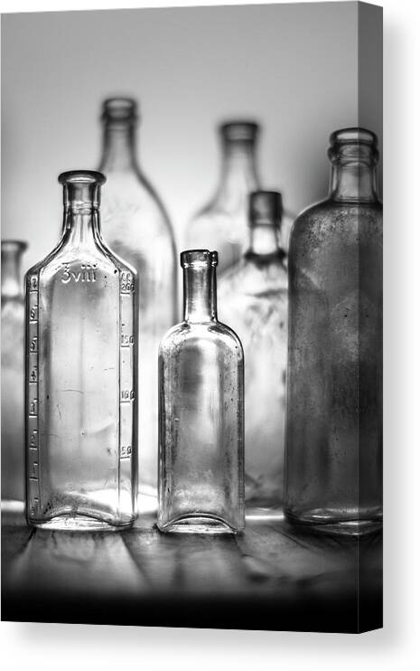Glass Bottles
Studio Shot Canvas Print featuring the photograph 7 Botellas 2 by Moises Levy