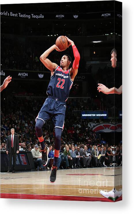 Otto Porter Jr Canvas Print featuring the photograph Philadelphia 76ers V Washington Wizards #7 by Ned Dishman
