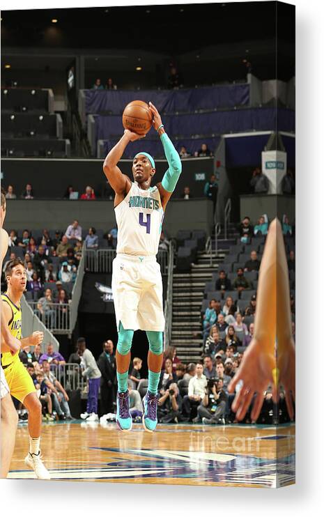 Nba Pro Basketball Canvas Print featuring the photograph Indiana Pacers V Charlotte Hornets by Kent Smith