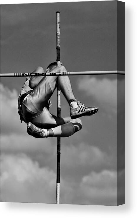 Sport Canvas Print featuring the photograph A Cross In The Sky by Jure Kravanja