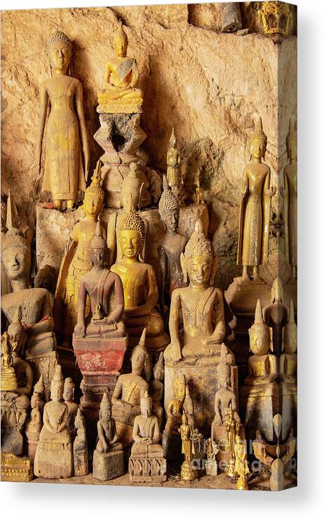 Pak Ou Caves Canvas Print featuring the photograph A Few of the 5000 by Bob Phillips