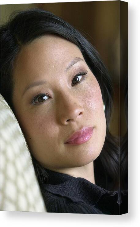 Central Park Canvas Print featuring the photograph Actress Lucy Liu At The Ritz Carlton On by New York Daily News Archive