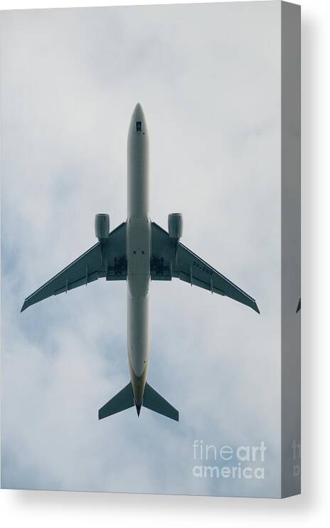 Airplane Canvas Print featuring the photograph Airplane Flying Overhead by Sergio Amiti