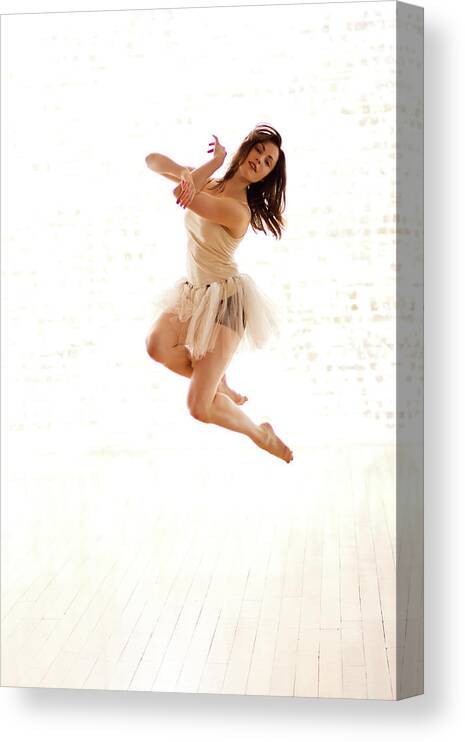 Ballet Dancer Canvas Print featuring the photograph Ballet Dancer In White Tutu by Phil Payne Photography
