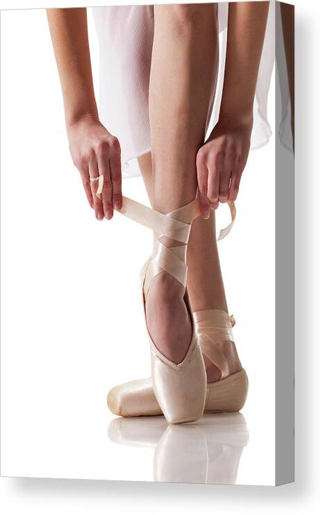 Ballet Dancer Canvas Print featuring the photograph Ballet Slipper Isolated On White by Proxyminder