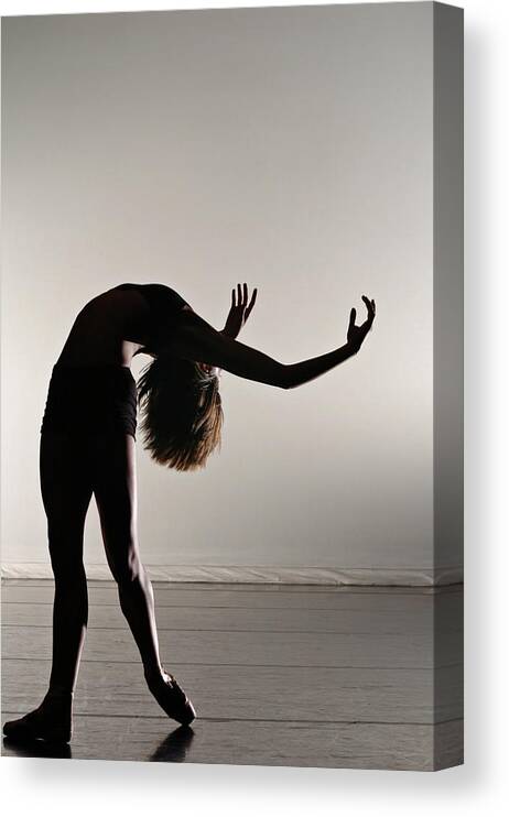 People Canvas Print featuring the photograph Bending by Copyright Christopher Peddecord 2009