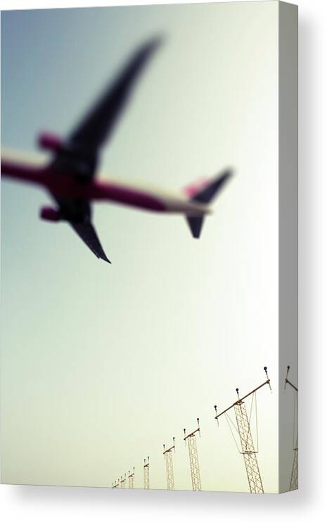 Mid-air Canvas Print featuring the photograph Commercial Jet by Greg Bajor