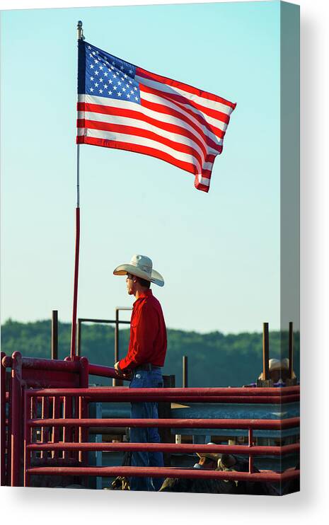 Americanflag Canvas Print featuring the photograph Cowboy and American Flag by Dennis Dame