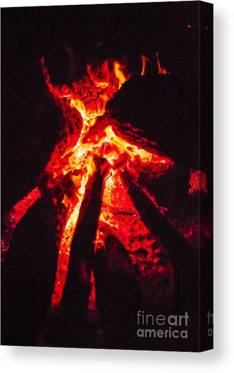 Fire Canvas Print featuring the photograph Details of campfire outdoors by Benny Marty