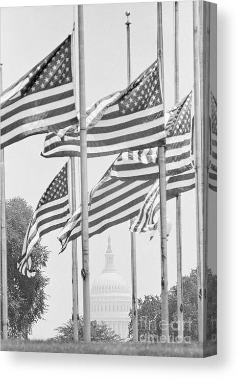 Pole Canvas Print featuring the photograph Flags Flying At Half-mast by Bettmann