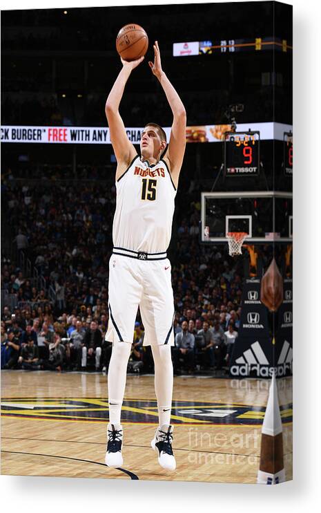 Nba Pro Basketball Canvas Print featuring the photograph Golden State Warriors V Denver Nuggets by Garrett Ellwood
