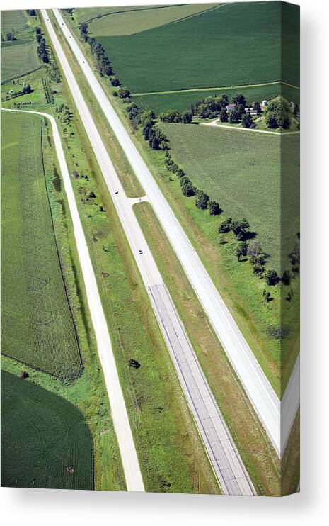 Land Vehicle Canvas Print featuring the photograph Interstate Highway Passes Through Rural by Banksphotos