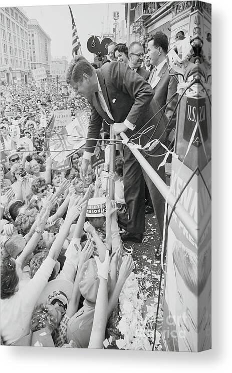 People Canvas Print featuring the photograph John F. Kennedy Greeting Supporters by Bettmann