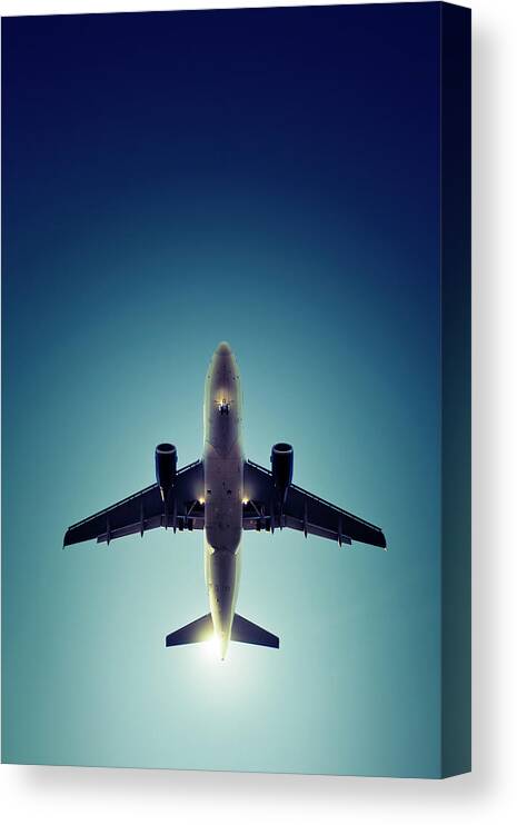 Engine Canvas Print featuring the photograph Landing Airplane At Dusk by Ollo