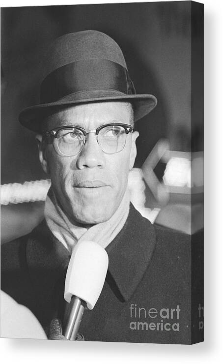 Fedora Canvas Print featuring the photograph Malcolm X Being Interviewed by Bettmann