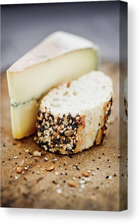 Aging Process Canvas Print featuring the photograph Morbier Cheese On A Board With Seeded by Richard Boll