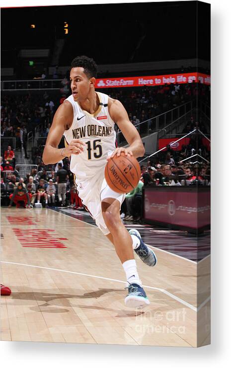 Frank Jackson Canvas Print featuring the photograph New Orleans Pelicans V Atlanta Hawks by Jasear Thompson