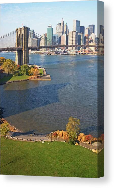 Water's Edge Canvas Print featuring the photograph Park And Cityscape by Fotog