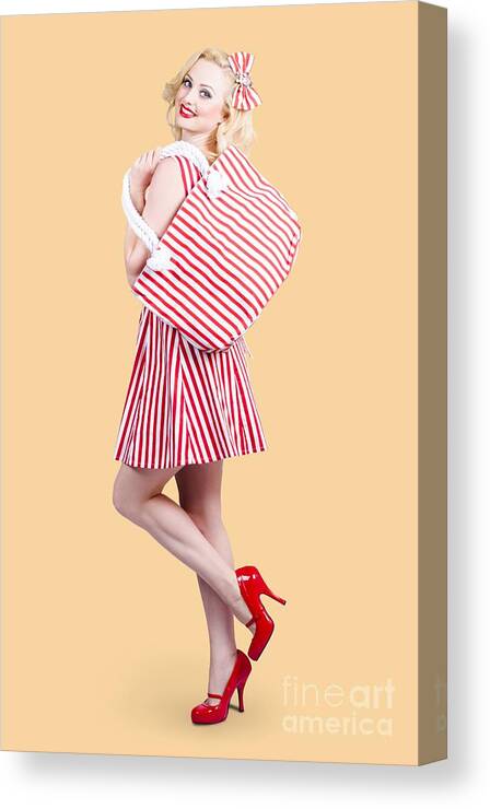 Shopper Canvas Print featuring the photograph Pin up girl wearing stripped red dress holding bag by Jorgo Photography