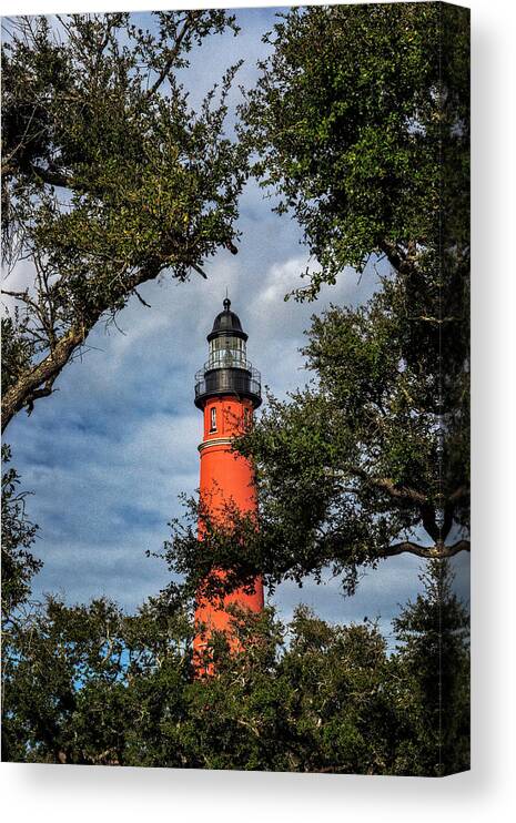 Barberville Roadside Yard Art And Produce Canvas Print featuring the photograph Ponce Inlet Lighthouse by Tom Singleton