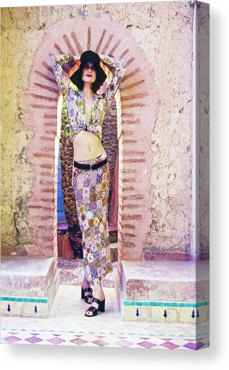 Fashion Canvas Print featuring the photograph Shalom Harlow Wearing A Patchwork Outfit by Arthur Elgort