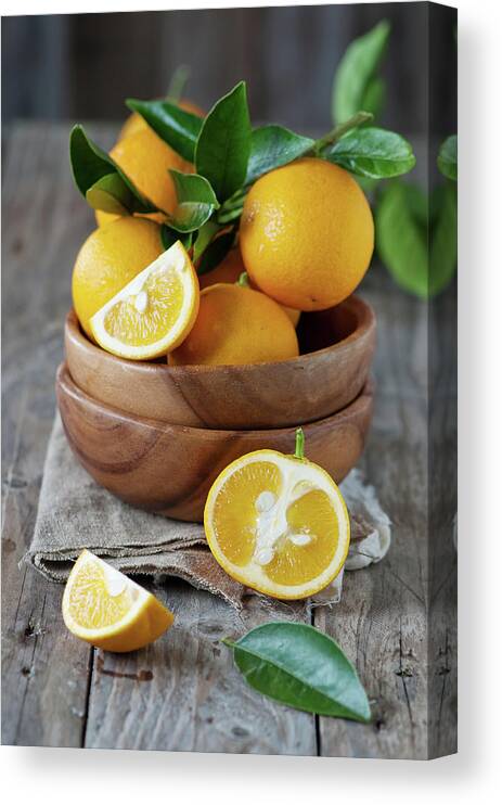 Orange Color Canvas Print featuring the photograph Sweet Oranges by Oxana Denezhkina