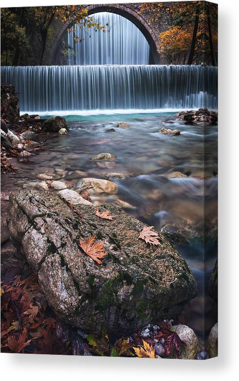 Greece Canvas Print featuring the photograph The Rock And The Water by Elias Pentikis