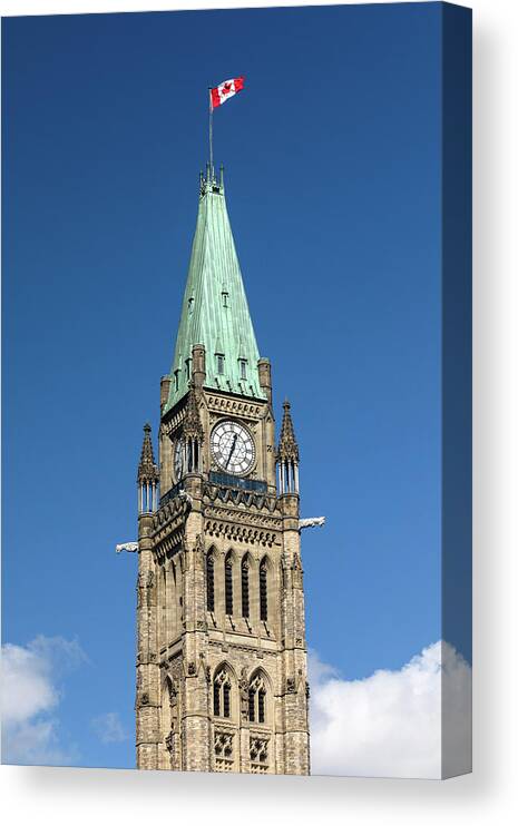 Parliament Canvas Print featuring the photograph The Top of the Peace Tower at Parliament Hill by Michael Russell