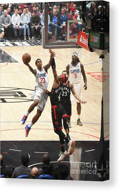 Lou Williams Canvas Print featuring the photograph Toronto Raptors V Los Angeles Clippers by Adam Pantozzi
