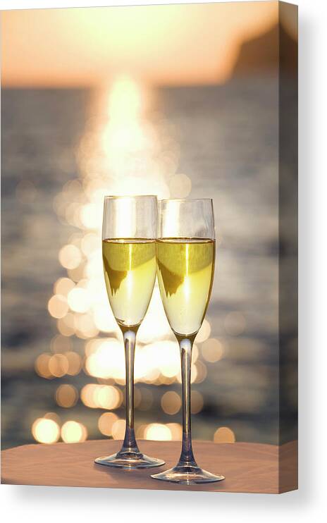 Celebration Canvas Print featuring the photograph Two Glasses Of Champagne At Sunset by Bill Holden