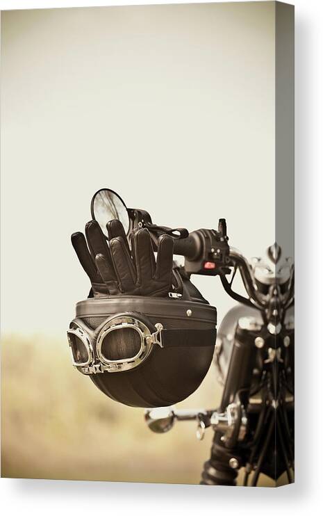 Crash Helmet Canvas Print featuring the photograph Vintage Helmet And Gloves On Motorcycle by Vtwinpixel