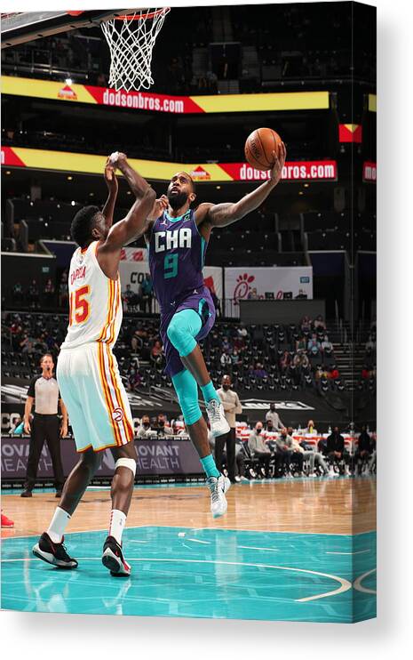 Nba Pro Basketball Canvas Print featuring the photograph Atlanta Hawks v Charlotte Hornets by Kent Smith