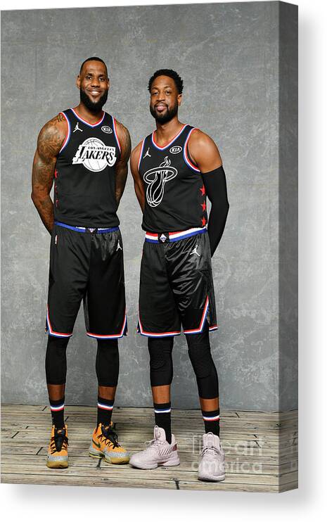 Lebron James Canvas Print featuring the photograph Dwyane Wade and Lebron James #1 by Jesse D. Garrabrant