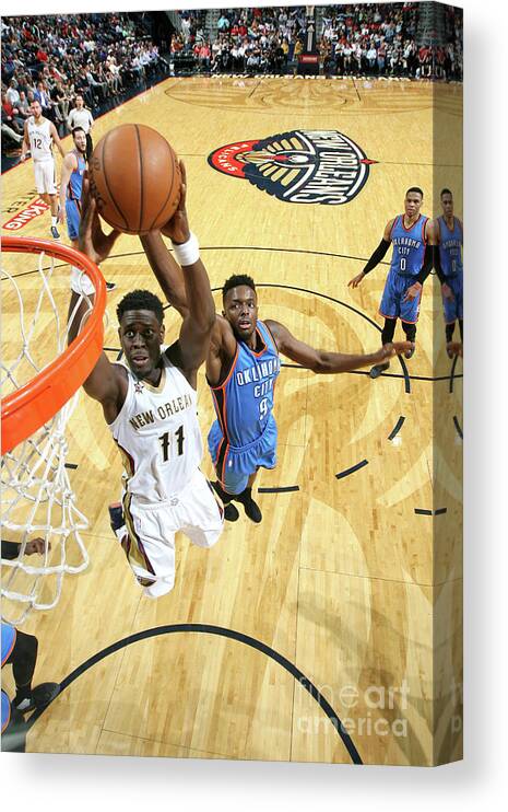 Jrue Holiday Canvas Print featuring the photograph Jrue Holiday by Layne Murdoch