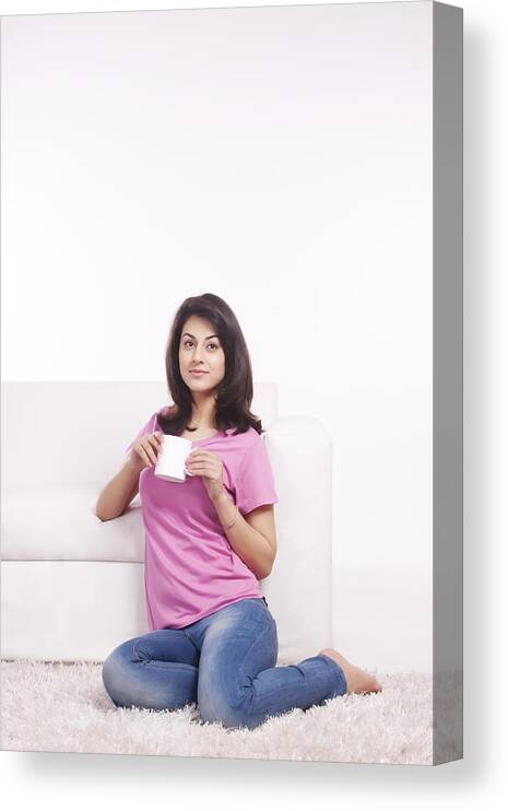 Rug Canvas Print featuring the photograph Portrait of a woman with a mug of tea #1 by Sudipta Halder
