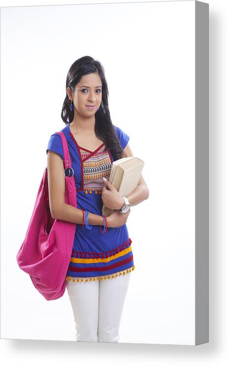 Three Quarter Length Canvas Print featuring the photograph Portrait of college girl with book #1 by IndiaPix/IndiaPicture