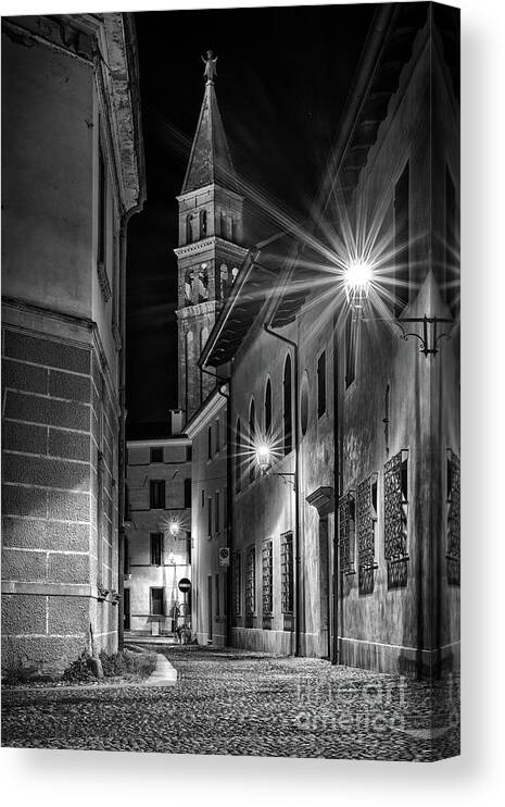 Oderzo Canvas Print featuring the photograph Small street leading to the bell tower #1 by The P