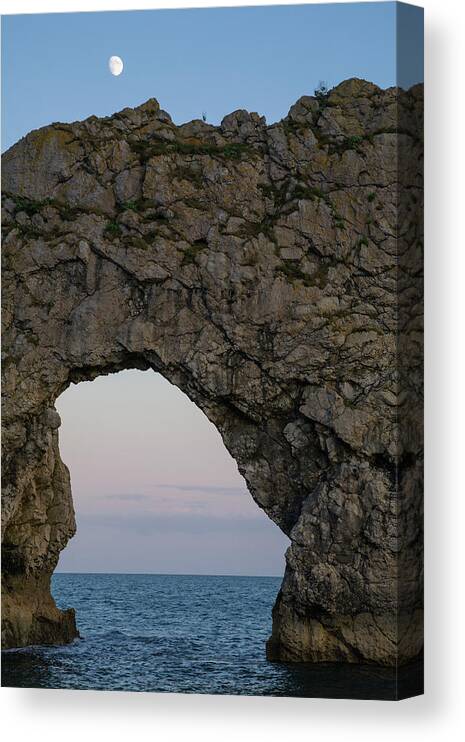Durdle Canvas Print featuring the photograph Under the rising moon #1 by Ian Middleton