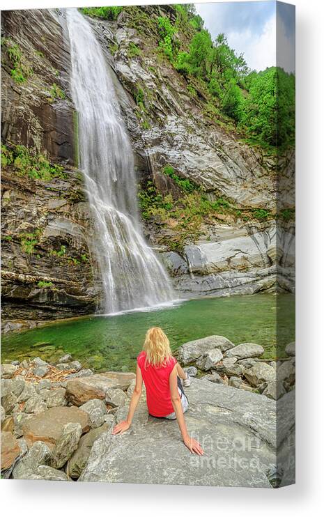Switzerland Canvas Print featuring the photograph woman in great waterfall of Bignasco #1 by Benny Marty