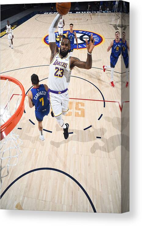 Nba Pro Basketball Canvas Print featuring the photograph Lebron James by Garrett Ellwood