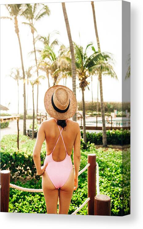 Tranquility Canvas Print featuring the photograph Woman by the pool #17 by Orbon Alija