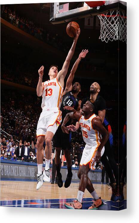 Bogdan Bogdanovic Canvas Print featuring the photograph 2021 NBA Playoffs - Atlanta Hawks v New York Knicks by Nathaniel S. Butler