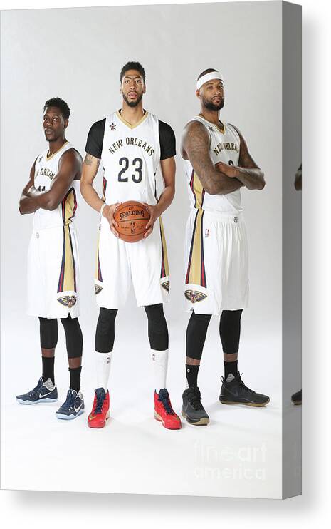 Jrue Holiday Canvas Print featuring the photograph Demarcus Cousins, Jrue Holiday, and Anthony Davis by Layne Murdoch