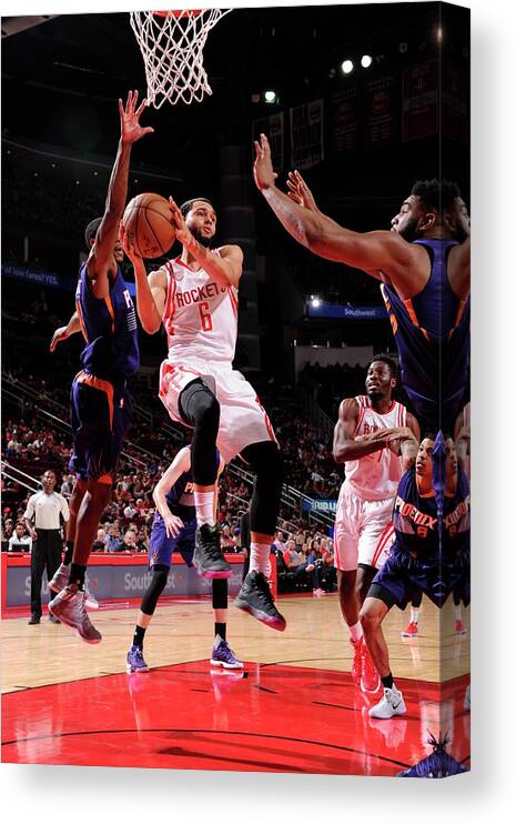 Nba Pro Basketball Canvas Print featuring the photograph Tyler Ennis by Bill Baptist