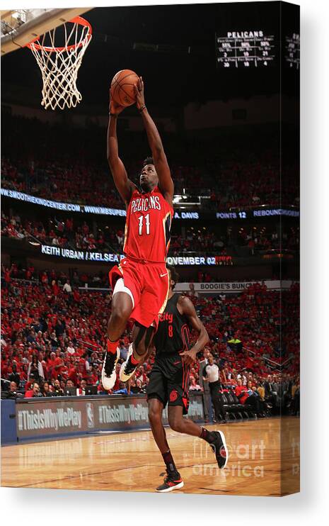 Jrue Holiday Canvas Print featuring the photograph Jrue Holiday by Layne Murdoch